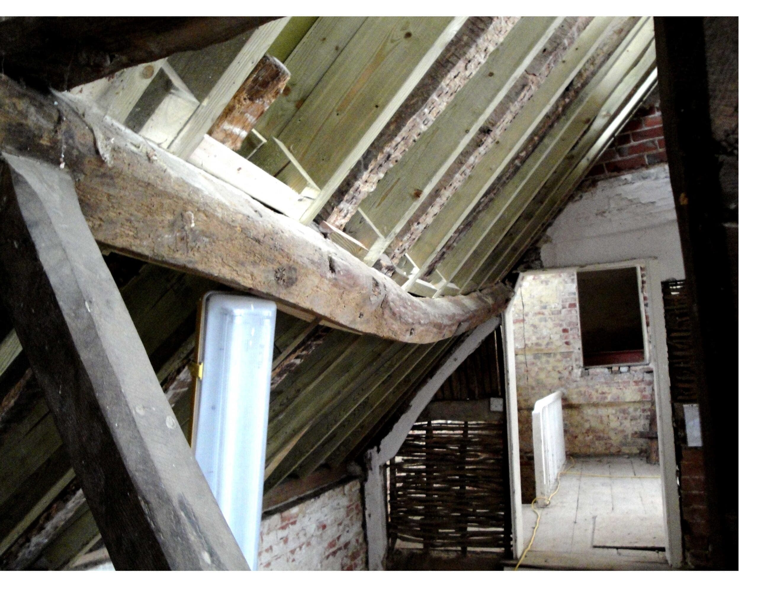 Insulating breather membrane used with uneven rafters